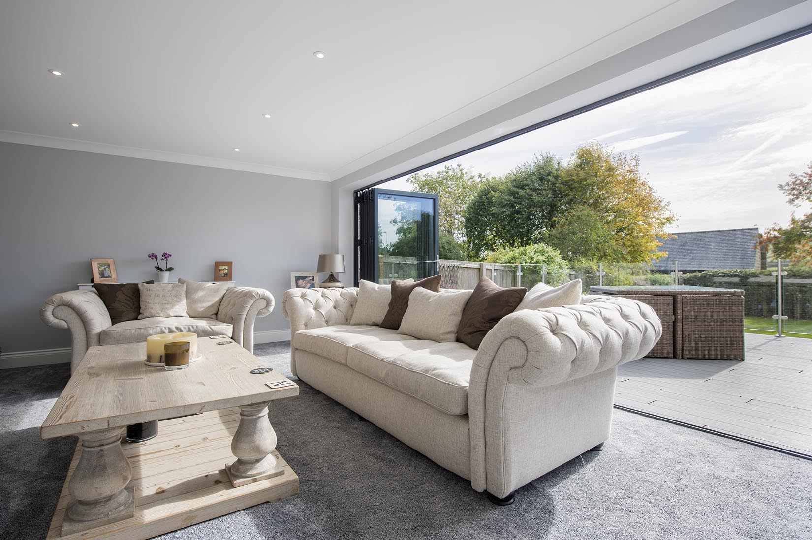 Bi-fold doors in the living room create a much lighter room
