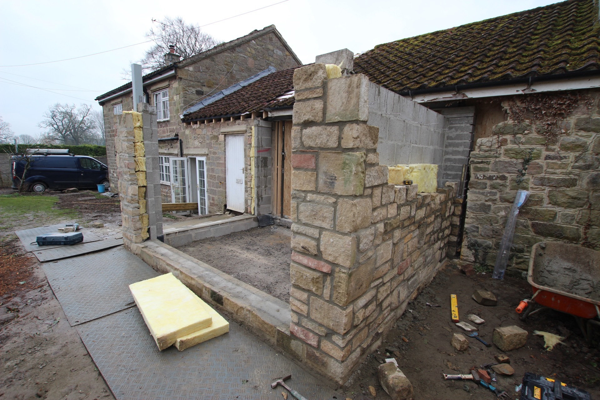External structure of extension including blockwork, insulation and stonework